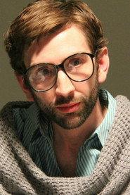 Thom Woodley as Newscaster in The Grey Matter 2014