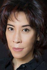 Midori Nakamura as Joan in A Conflict of Love Interest 2024