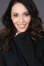 Stephanie Maura Sanchez as Newscaster in Carole's Christmas 2019