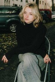 Anna Schier as Reporter / Camera Operator in AVAV 2026