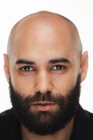 Issam Dakka as Imam in Rachid 2023