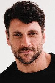 Giorgos Chrysostomou as Τάσος in Hellas 3.0 2026
