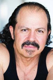 Mike Caravella as Mikey Forearms in LA LA Land 2008