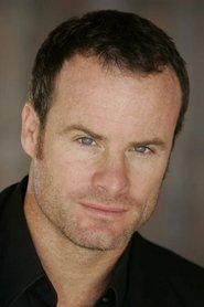 Andy Dylan as Security Officer in Descent 2004
