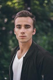 Landon Taverniér as Jimmy in Turbo Cola 2022