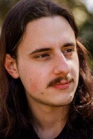 Steve Combin as Anton in Holly 2026