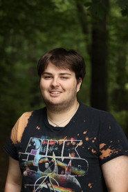 Owen Kirkpatrick as Frank in Dead In The End 2023