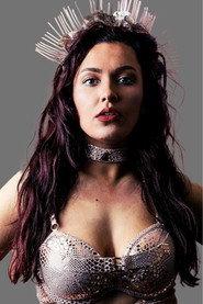 Amira Blair as Amira, Claudia Winkleman in EVE 144: The Multiverse Rumble 2026