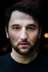 Taner Sahintürk as Özcan Yildirim in The Barber And The Bomb 2016