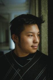 David Crocpsy Li as Pedestrian (Uncredited) in 10 Years Later 2025