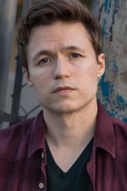 Michael Varde as Guy in The Movie Extra 2015