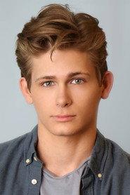 Johnny McCurrin as Dead Male in Desecrated 2024