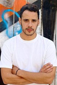 Adel Djemai as TJ in Douze Points 2019