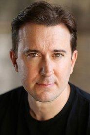 Darren Benedict as 'Good' Cop in Benny Loves You 2019