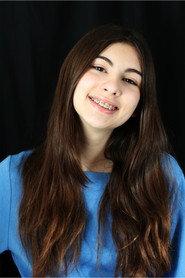 Laura Araujo as Little Miss Sinster in Mint in Box 2025