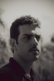Jonathan Natalizio as The Traveler in Memories of a Rainy Day 2023