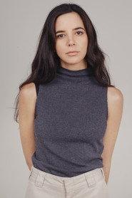 María Jesús Marcone as Clara Garcia in What the Tide Dragged In 2025