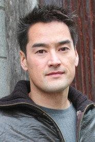 Christopher Ang as Officer in Garage Sale Mystery: All That Glitters 2014