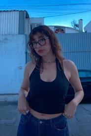 Asuany Amador as Radio (Voz) in La Femme 2022