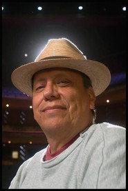 Tito Vasconcelos as Yoga Instructor / Taxi Driver / Painter / Saleswoman / Mariachi / Hairdresser / Cyclist in Esmeralda Comes by Night 1997