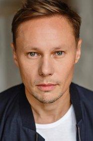 Rashid Aitouganov as Policeman / Trafficker (voice) in Flee 2021