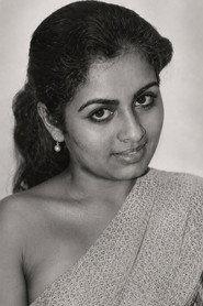Kuyili as  in Mullil Roja 2003