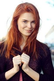 Darya Lebedeva as reporter at the station in Scary Lullaby 2026