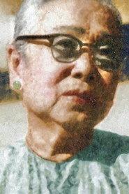 Năm Sa Đéc as Mama Sáu in Flooding Season 1986