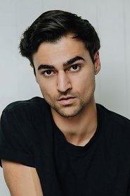 Noah Paul as Travis in The Stars Between Us 2026