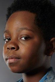 Braelyn Rankins as Teddy Hodges in 8-Bit Christmas 2021