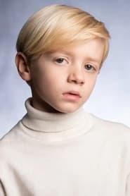 Dexter Sol Ansell as Young Coriolanus in The Hunger Games: The Ballad of Songbirds & Snakes 2023