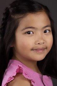Naomi Tan as Young Suzy in A Sugar & Spice Holiday 2020