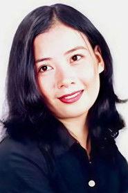 Lê Ngọc Dung as Huong in The Vertical Ray of the Sun 2000
