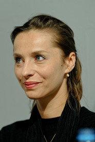 Kamila Wojciechowicz as Ważniak's Wife (segments "Mebel", "Kobieta o dwóch sercach") in Neighborhooders 2014