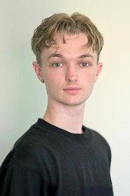 Peter Sullivan as John Price in Behind the Eight Ball 2020