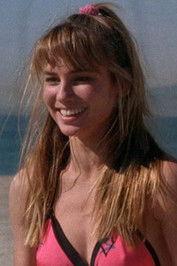 Devon Jenkin as Melody in Slammer Girls 1987