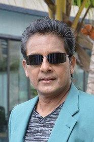 Mukesh Hariawala as Bar Owner in Chicken Curry Law 2019