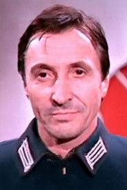 Edilio Kim as Captain Hardinghauser in The Beast in Heat 1977
