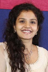 Maya Preethi as Mona in Leelai 2012