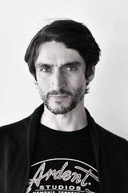 Reid Anderson as Professor Liam O'Connor (voice) in Sirocco 9 2016