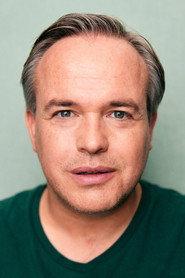 Peter Stray as The Representative in The Tomorrow Job 2023