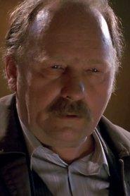 Ryszard Fischbach as SB Officer "Old Man" in The Pigs 1992