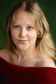 Katie Dobbins as Cassie Brown in Teething Problems 2025