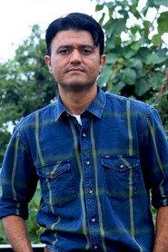 Ashish Bisht as Ashish in Milk, Rice and the Blood 2025