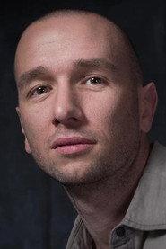 James Sheldon as Johnny in Larva 2005