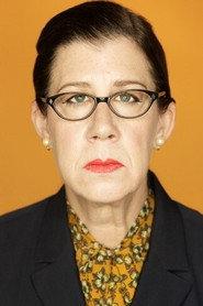 Maggie Carney as Miss. Iris Crum in Lucky Stiff 2014
