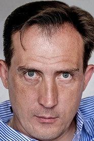 Aleksey Starchenko as ZAM in Tolya 2019