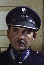 Janusz Dąbrowski as Militiaman in The Weather Forecast 1983