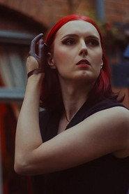 Kat B. as Katie in The Moon is a Hologram 