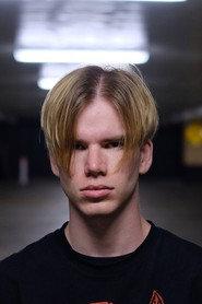 Nicholas C Flynn as Patrice in GOVERNMENT MAN 2022